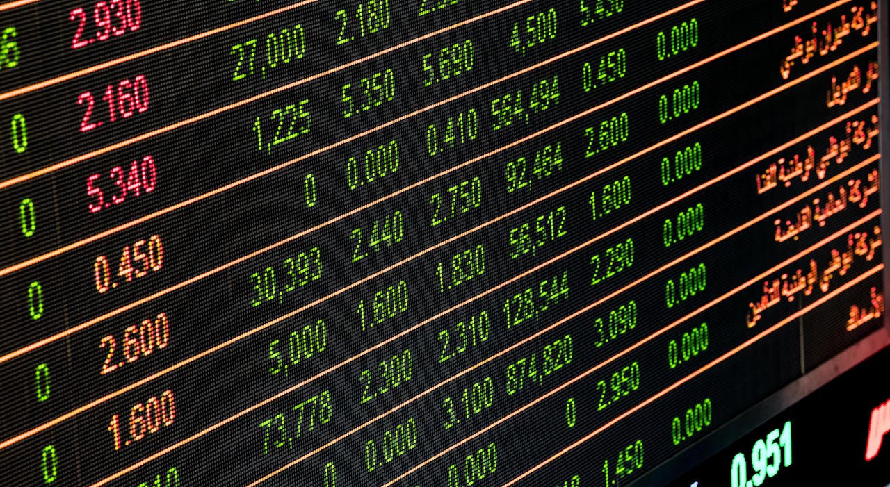 services-02 Detailed view of a stock market screen showing numbers and data, symbolizing financial trading.